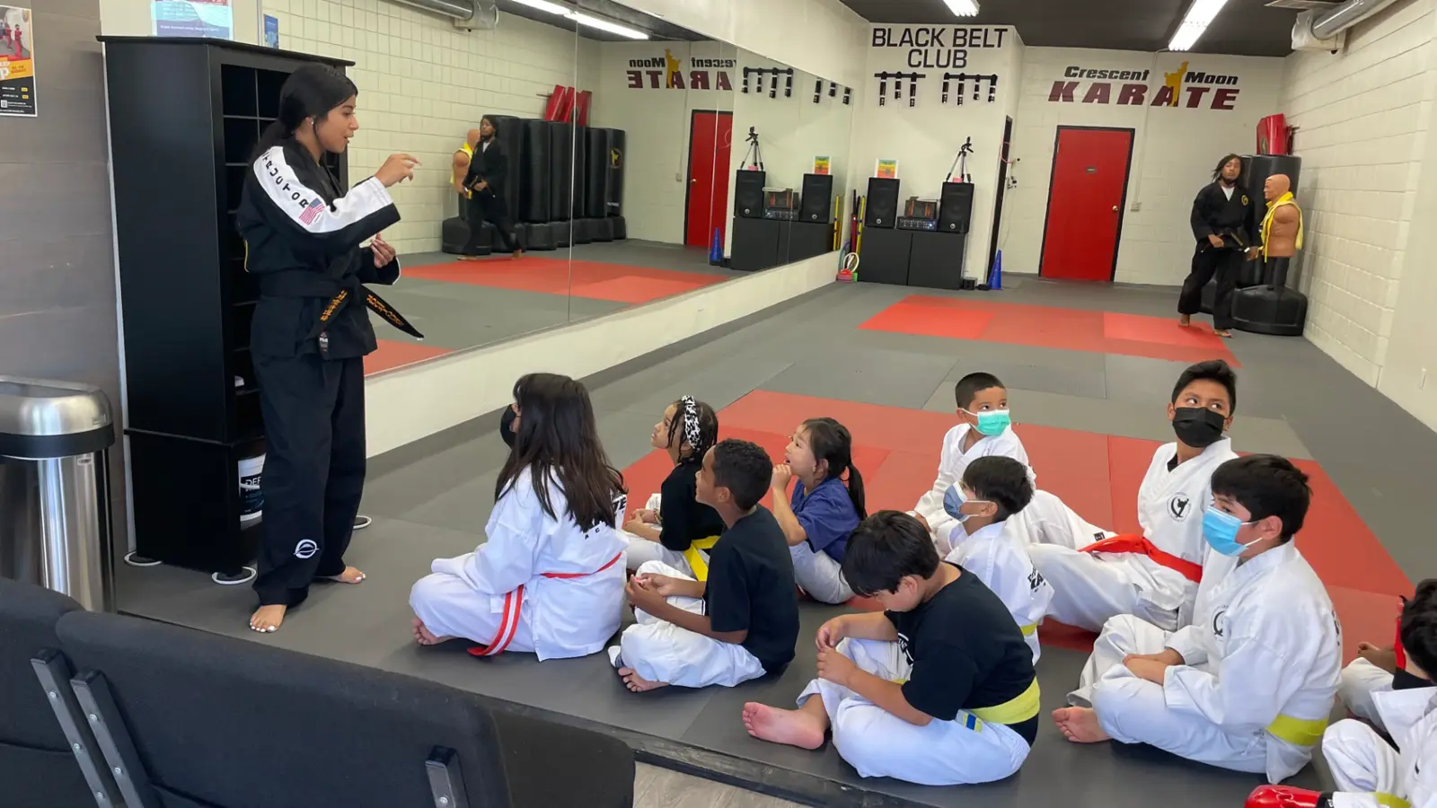 A karate class lined up in formation during training